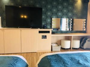 TV a/nebo společenská místnost v ubytování Hotel Square FujiGotemba