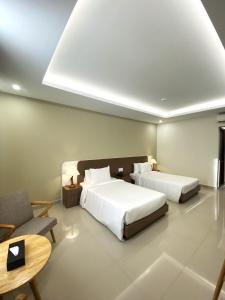 Posteľ alebo postele v izbe v ubytovaní The HUB Hotel - Airport