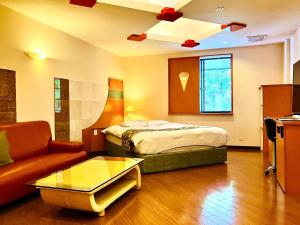 Postel nebo postele na pokoji v ubytování Hotel Square FujiGotemba