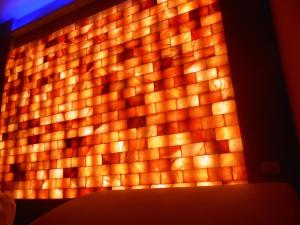 a brick wall with a bench in front of it at Hotel Lory My Wellness SPA in Chianciano Terme