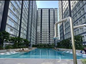 a swimming pool in a city with tall buildings at Canopy Hill by Azli in Kajang