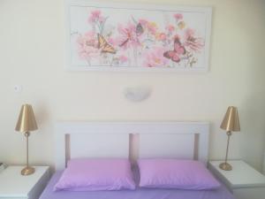 Postel nebo postele na pokoji v ubytování Harmony II