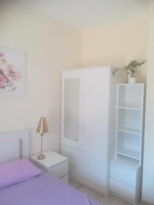 Postel nebo postele na pokoji v ubytování Harmony II