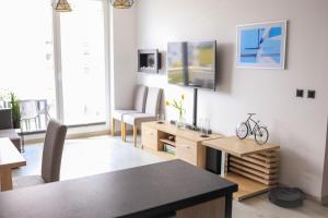 TV a/nebo společenská místnost v ubytování Apartament Kapitański