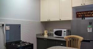 Kuchyň nebo kuchyňský kout v ubytování Beau Vallon Studios - Apartments Vacation Rentals