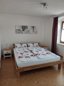 a bed sitting in a room with at Strehla Markt in Strehla