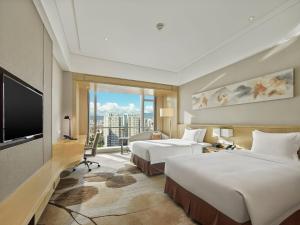 TV a/nebo společenská místnost v ubytování Crowne Plaza Fuzhou Riverside by IHG