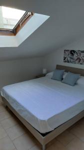 Ένα ή περισσότερα κρεβάτια σε δωμάτιο στο Casa Mamus