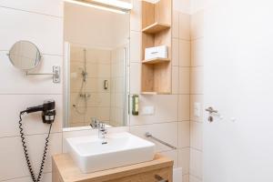 Łazienka w obiekcie Almresort Gartnerkofel Nassfeld