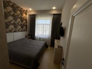 Letto o letti in una camera di GS Premium