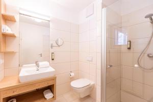 Łazienka w obiekcie Almresort Gartnerkofel Nassfeld