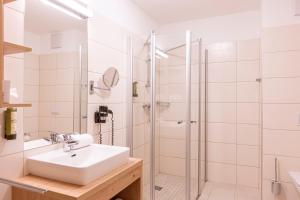 Łazienka w obiekcie Almresort Gartnerkofel Nassfeld