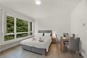 Postel nebo postele na pokoji v ubytování Alta Vista - Happy Rentals + 11 fotografií