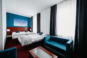 Postel nebo postele na pokoji v ubytování Hotel Color