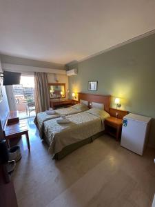 Posteľ alebo postele v izbe v ubytovaní Paradise Lost Hotel-Apartments