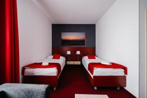 Postel nebo postele na pokoji v ubytování Hotel Color
