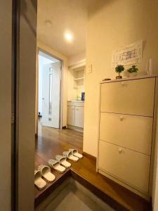 Ett badrum på Gest Residence Hakata Tenjin self check in