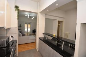 Kuchyň nebo kuchyňský kout v ubytování Zen Oasis Apartment