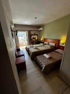 Posteľ alebo postele v izbe v ubytovaní Paradise Lost Hotel-Apartments