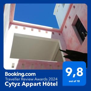 a building with a sign that reads cozy apartment hotel at Cytyz Appart Hôtel in Mahajanga