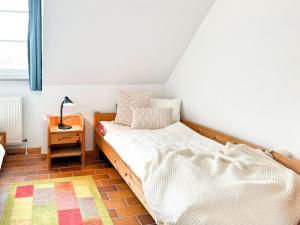 Postel nebo postele na pokoji v ubytování Residenz Kormoran, Ankerzeit