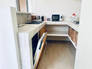 Kuchyň nebo kuchyňský kout v ubytování Sandy - Scala dei Turchi apartment