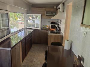A kitchen or kitchenette at ILIAKTI RELAXING SEASIDE
