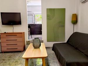 A television and/or entertainment centre at ILIAKTI RELAXING SEASIDE