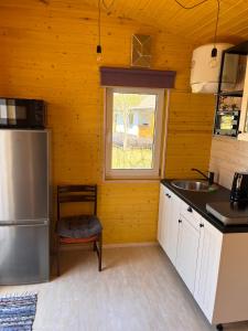 Kuchyň nebo kuchyňský kout v ubytování Katase Tiny House