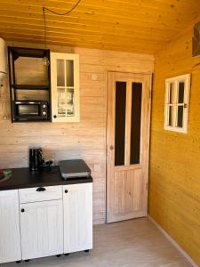 Kuchyň nebo kuchyňský kout v ubytování Katase Tiny House