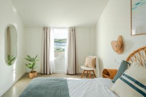 Ένα ή περισσότερα κρεβάτια σε δωμάτιο στο Villas de La Ribera