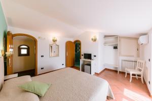Postelja oz. postelje v sobi nastanitve Albergo La Margherita