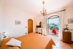 Postelja oz. postelje v sobi nastanitve Albergo La Margherita