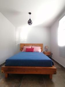 Postel nebo postele na pokoji v ubytování Casa do Favinha
