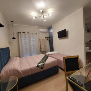 TV a/nebo společenská místnost v ubytování Akropoli Exclusive Room