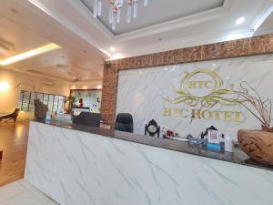 a lobby of a hotel with a reception counter at HTC Hotel Tuần Châu Island in Ha Long