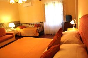 Voodi või voodid majutusasutuse Agriturismo Poggio de Papi toas