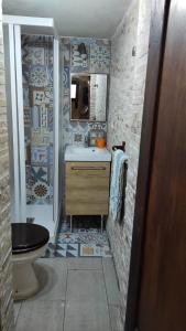 Koupelna v ubytování A Due Passi dal Centro