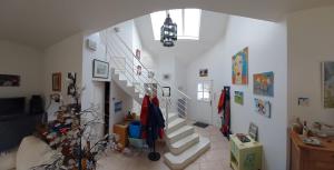 Μια τηλεόραση ή/και κέντρο ψυχαγωγίας στο Chambres d'hôtes,Chez Dom