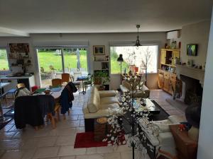 Χώρος καθιστικού στο Chambres d'hôtes,Chez Dom