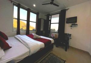 Postelja oz. postelje v sobi nastanitve The Lake Cottage by VRB Hotels