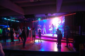 a group of people dancing on a dance stage at Dawlish Warren Welcome family holiday park South Devon Willow villa Welcome2Warren in Dawlish Warren +51 photos