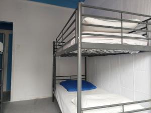 a bunk bed room with two bunk beds in a room at ACROPOLIS ViEW MIXED DORMITORIES 1 MINUTE BY THISSIO METRO STOP in Athens