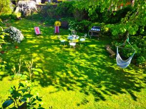Κήπος έξω από το La FERME DU TILLEUL Chambres d hôtes tout conforts - familiale - entre amis - pro