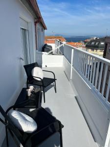 Un balcón o terraza de Hogar Ribeiriña Ribeira