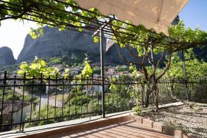a balcony with a view of a mountain at Romance Dream Meteora 2 in Kalabaka