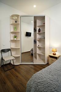 Апартаменты в Аркадии - Arcadia Sky Apartments客房内的一张或多张床位