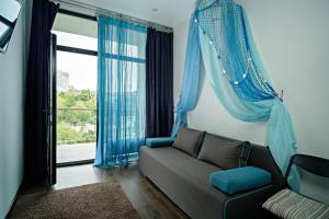 Апартаменты в Аркадии - Arcadia Sky Apartments的休息区