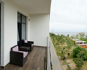 Апартаменты в Аркадии - Arcadia Sky Apartments的阳台或露台