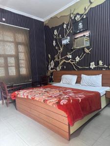 Cama ou camas em um quarto em Hotel Star INN